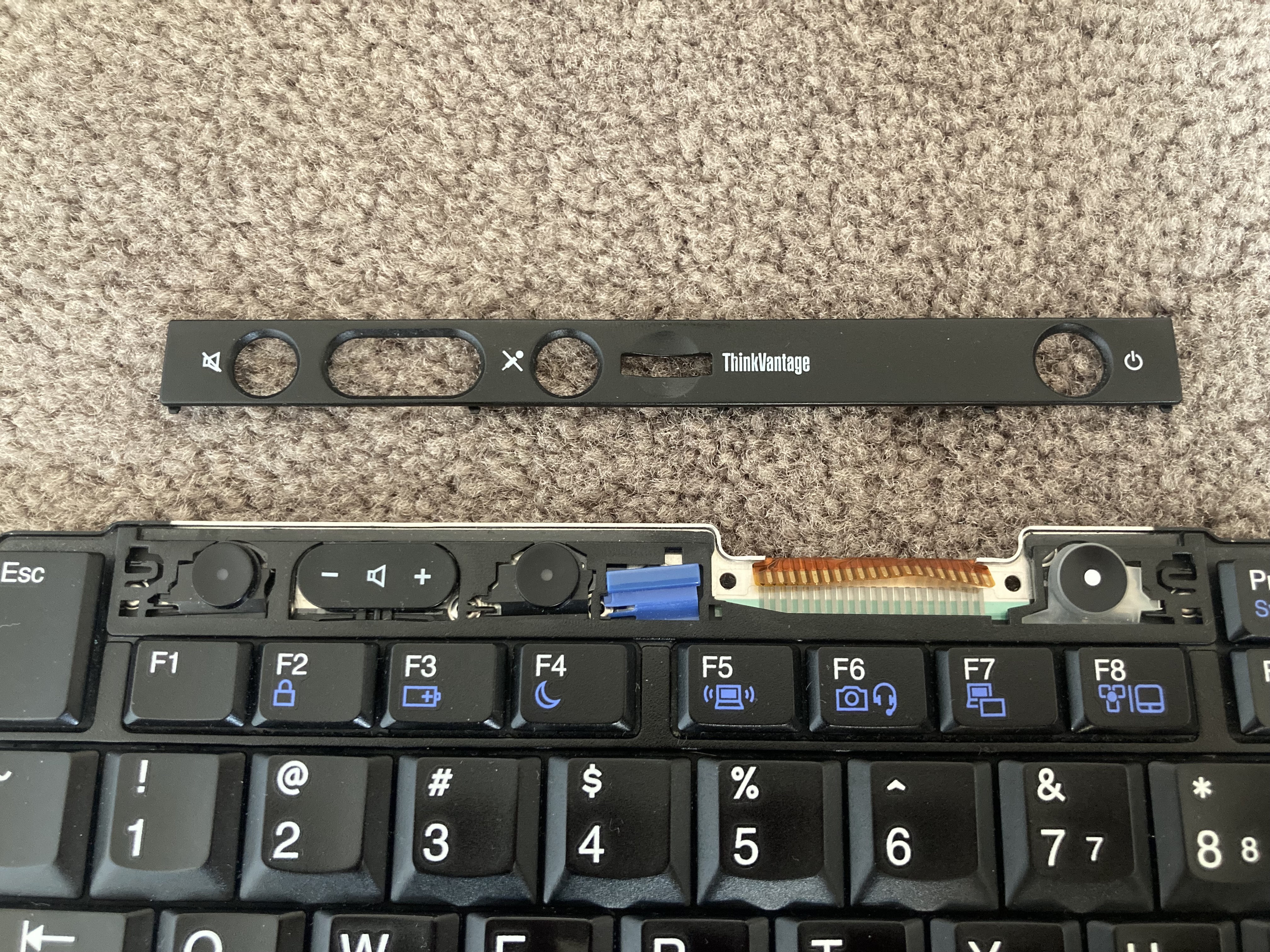 The top of the x220 keyboard
with the function buttons faceplate removed